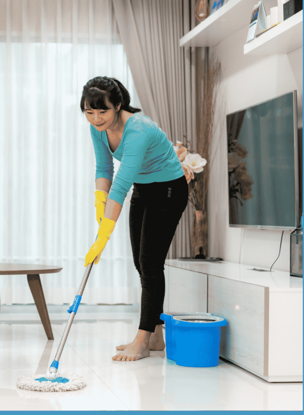 Team mopping a bright office lobby